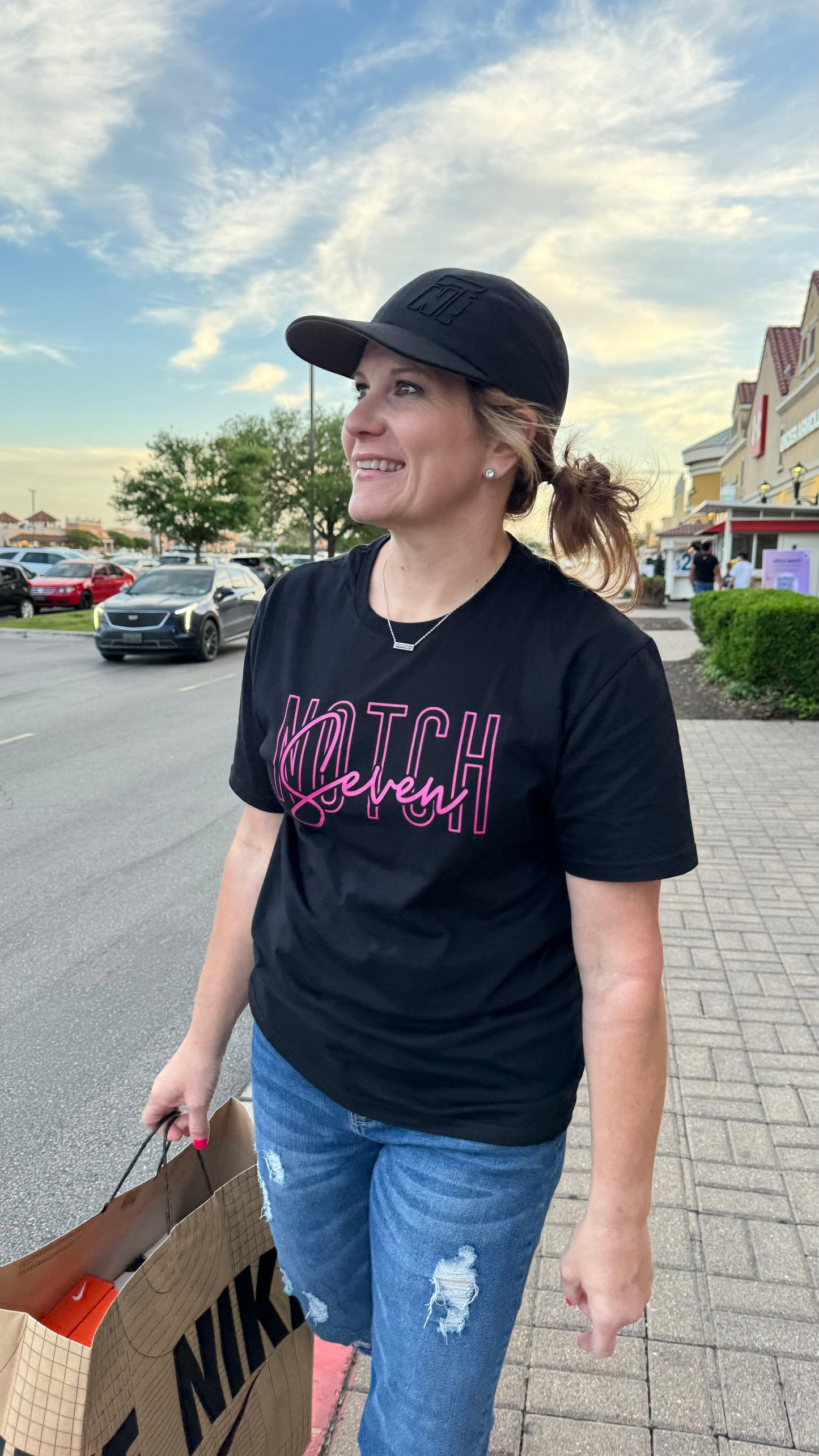 available in Black or Grey 50/50 blend T shirt with our Vibrant Pink Notch Seven spelled out on the front of the shirt in a stylish block fashion