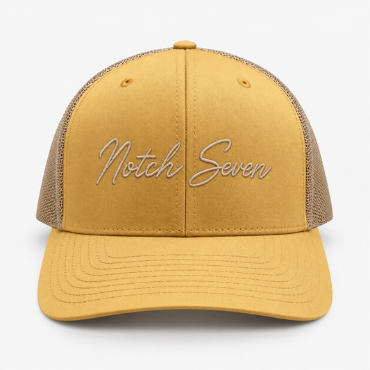 AMBER GOLD RICHARDSON 112 TRUCKER HAT WITH CURSIVE LOGO