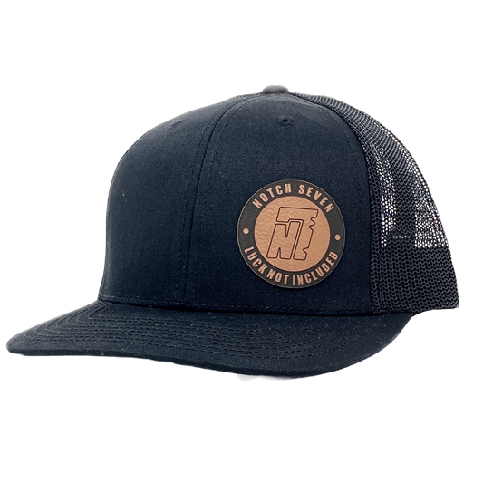 Black Trucker Hat with Leather "Luck Not Included" Emblem